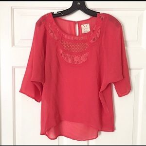 Urban Outfitters pinkish/reddish flowy blouse.